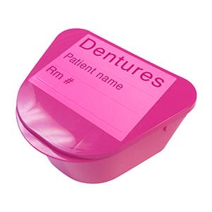 Pink denture storage case with labeled lid for patient name and room number