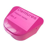 Pink denture storage case with labeled lid for patient name and room number