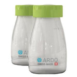 Two ARDO Swiss Made milk storage bottles with green lids for infant feeding essentials