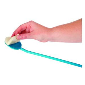 Hand holding a long-handled bathing aid with a sponge for assisted personal care