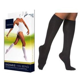 Black knee-high compression socks and product packaging for leg circulation support