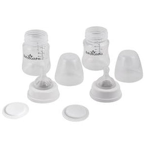 Two clear baby milk bottles with measurement markings, lids, and detachable bases on white background