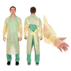 Man wearing a yellow disposable medical isolation gown with long sleeves and back ties.
