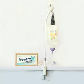 Tube feeding stand holding a nutrition bag and pump beside FreeArm Muscle device sign