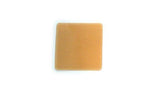 Square skin barrier wafer for ostomy care shown on a white background.