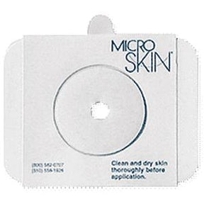 Microskin adhesive barrier ring with center hole for medical device attachment