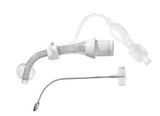 Medical tracheostomy tube with obturator and inflatable cuff on white background