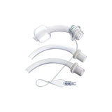 Medical tracheostomy tube set with curved clear tubes and inflation valve on white background