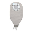Grey medical ostomy bag with circular opening and secure closure for stoma care