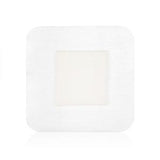 Sterile square adhesive wound dressing patch on white background