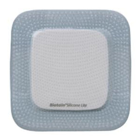 Square silicone wound dressing with perforated surface for medical use
