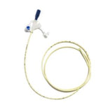 Sterile medical feeding tube with connector, coiled on white background