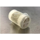 Transparent medical filter cartridge on a stainless steel surface
