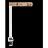 Disposable medical sensor with adhesive band and connector on black background
