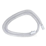 Flexible white CPAP hose for respiratory medical device on white background