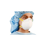 Healthcare worker wearing blue hair cover and N95 respirator mask for medical protection