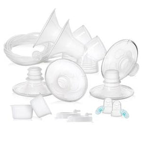 Breast pump parts and accessories set, clear plastic flanges, valves, and tubing on white background