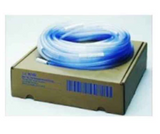 Coiled medical tubing on cardboard box for home medical supply delivery