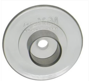 Close-up of a round medical supply part with central hole, metallic finish