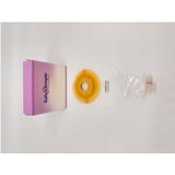 Ostomy pouch with barrier next to Safe n Simple packaging on white background