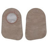 Pair of beige ostomy pouches with circular openings for medical use