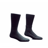 Pair of black crew-length medical socks on a white background