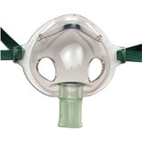 Clear adult oxygen mask with green elastic straps and connector, medical supply product
