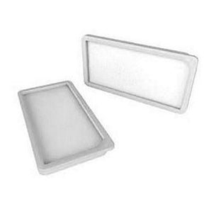 Rectangular white medical supply trays, essential for home healthcare and chronic condition support