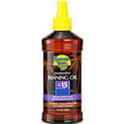 Banana Boat tanning oil SPF 15 bottle with yellow cap, palm tree design, for sun protection.