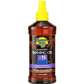 Banana Boat tanning oil SPF 15 bottle with yellow cap, palm tree design, for sun protection.