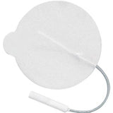 Round adhesive medical electrode pad with attached cable on white background