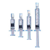 Four clear medical syringes in various sizes with measurement markings, sterile supplies