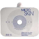 MicroSkin medical adhesive patch with circular cutout, used for secure ostomy appliance attachment