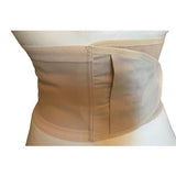 Adjustable beige medical back support belt worn on mannequin torso