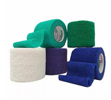 Assorted self-adhesive medical bandage rolls in blue, green, purple, and white colors
