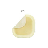Medical adhesive film dressing with rounded edges and lifted corner, used for wound care