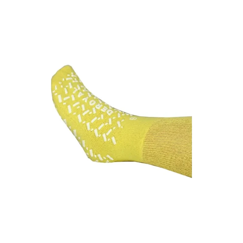 Yellow non-slip hospital sock with white grip treads for safety and comfort