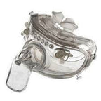 Clear full-face medical breathing mask for respiratory therapy on white background