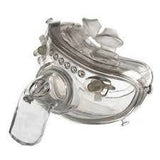 Clear full-face medical breathing mask for respiratory therapy on white background