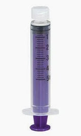 Purple oral medication syringe with clear cap and measurement markings