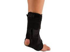Ankle and foot brace for support, black medical orthopedic boot on a person's foot