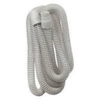Coiled CPAP machine hose for respiratory therapy and sleep apnea support