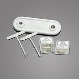 Medical infusion site accessories and components on gray background