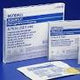 Sterile gauze wound dressings and bandages in medical packaging on blue background