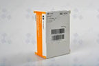 Medical supply box with barcode and orange label on white background, essential health product