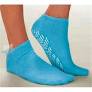 Blue non-slip medical grip socks on feet for home use and safety