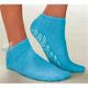 Blue non-slip medical grip socks on feet for home use and safety