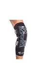 Orthopedic knee brace on leg for joint support and injury recovery