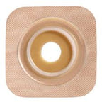 Beige ostomy barrier with adhesive border, medical ostomy supply for stoma care