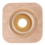 Beige ostomy barrier with adhesive border, medical ostomy supply for stoma care
